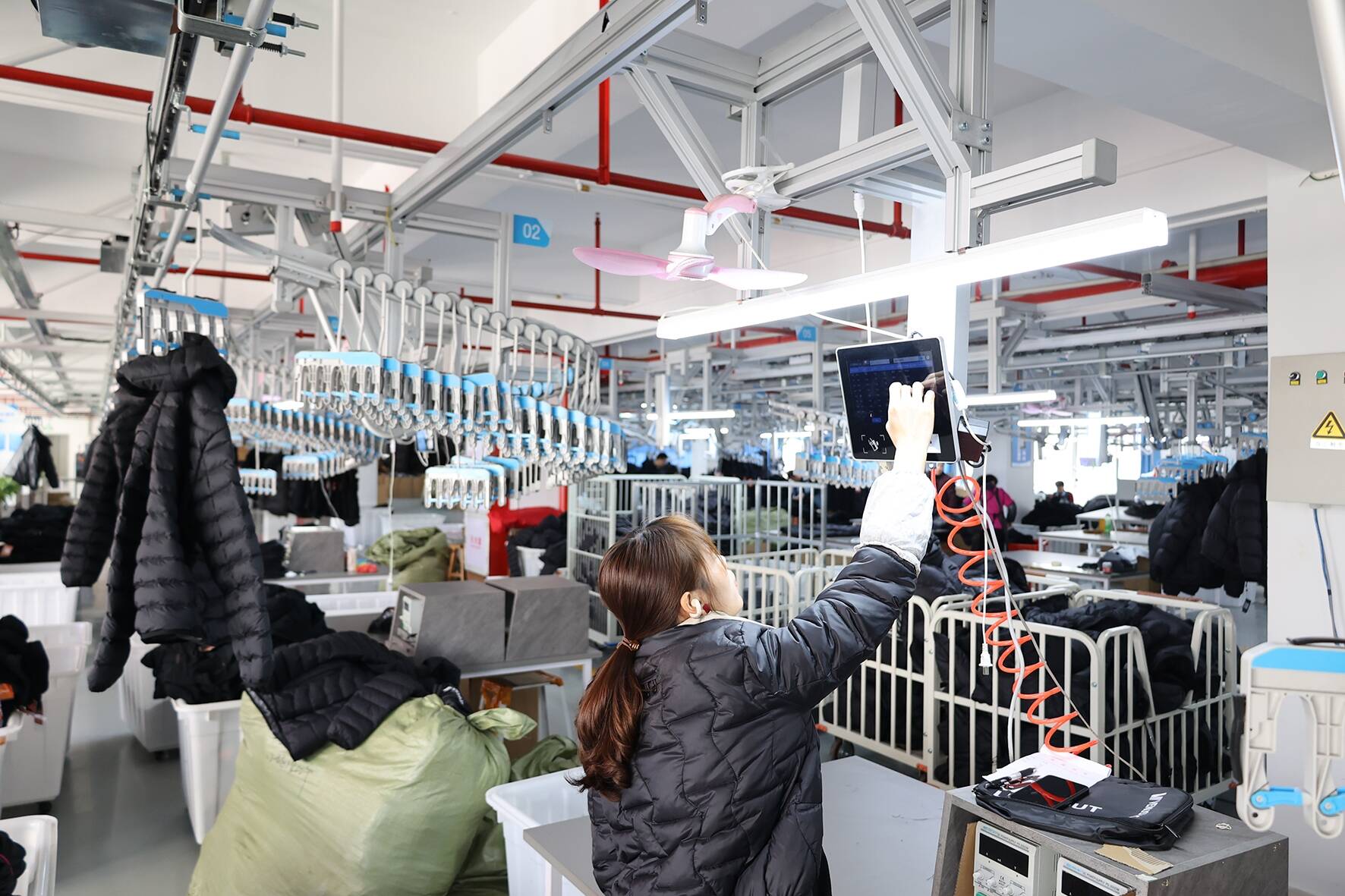 服装生产车间图片高清 2024031327c172af551638673e4a41f577da4350.jpg